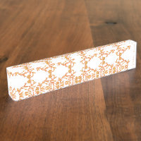 Symmetrisches Blumenmuster mit orangefarbenen Moti