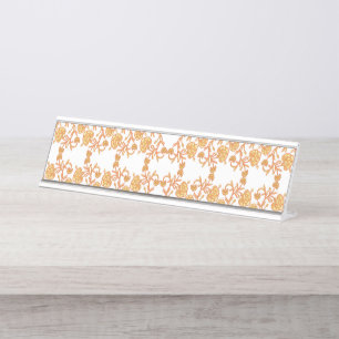 Symmetrisches Blumenmuster mit orangefarbenen Moti Schreibtischnamensplakette