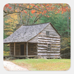 Szenen-historisches Blockhaus in rauchigem Quadratischer Aufkleber