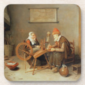 T31883 ein Innenraum mit einer alten Frau an einem Untersetzer (Vorderseite)