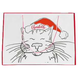 Tabby cat in der Weihnachtsmannmütze Weihnachten Große Geschenktüte