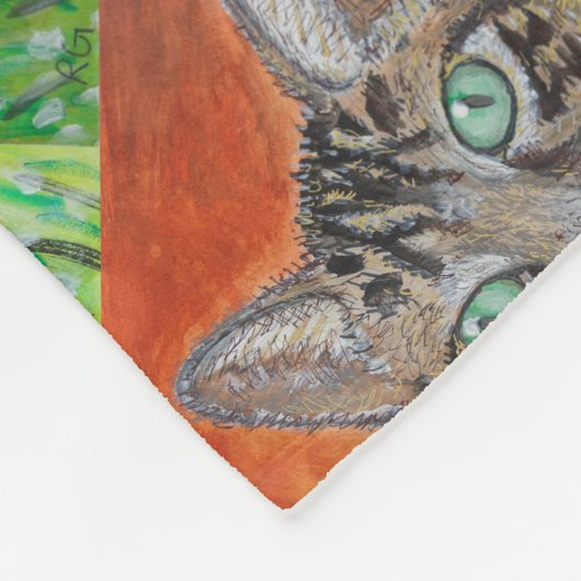 Tabby cat looking curious in grass fleece blanket (Ecke)