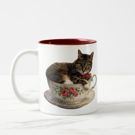 Tabby in einer Teetasse (Links)