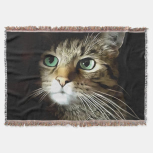 Tablettenkatze mit Abgeschiedenen grünen Augen auf Decke
