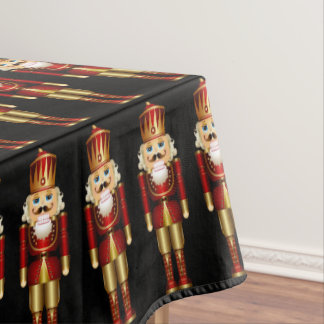 Tablettenkern mit roten und goldenen Nutcrackern Tischdecke
