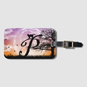 Tag für das erste Monogramm-Gepäck mit Vollmond un Gepäckanhänger