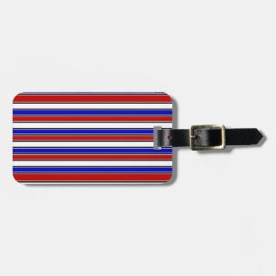 Tag mit rotem, weißem und blauem Gepäck Gepäckanhänger