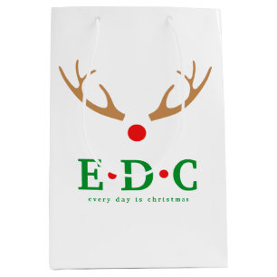 Täglich ist Weihnachten Mittlere Geschenktasche Geschenktüte