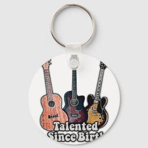 Talent seit Geburt. Vintage bunt Gitarre Schlüsselanhänger