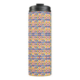 Tall tumbler with a vibrant, geometric pattern thermosbecher
