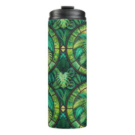 Tall tumbler with lush green tropical leaves  thermosbecher