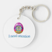 Tamagotchi "Ich brauche Aufmerksamkeit" Schlüsselanhänger (Rückseite)