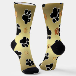 Tan und schwarze Pfoten auf goldenem Hintergrund # Socken
