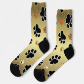 Tan und schwarze Pfoten auf goldenem Hintergrund # Socken (Linkes Detail)