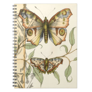 Tandem schlägt über grüne Blätter Notizblock