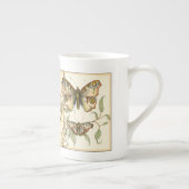 Tandem schlägt über grüne Blätter Porzellantasse (Rechts)