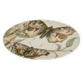 Tandem schlägt über grüne Blätter Schneidebrett (Ecke)