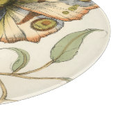 Tandem schlägt über grüne Blätter Schneidebrett (Ecke)