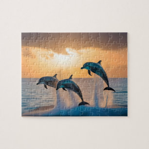 Tanzen in der Dämmerung: Drei Delphine springen Puzzle