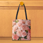 Tasche mit blassen rosa Nelken