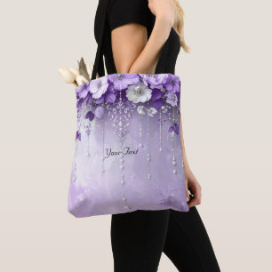 Tasche mit lila Blumen und baumelnden Perlen