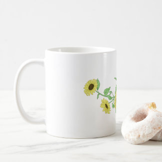 Tasse aus Glas mit Sonnenblumen