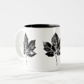 Tasse aus schwarzem und weißem Ahornblättern (Vorderseite Links)