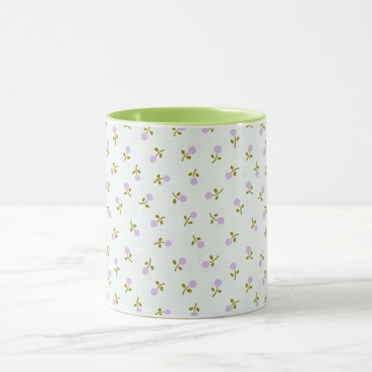 Tasse der Babyknospen mit farbenfroher Handgriff (Zentrum)