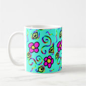 Tasse der Blume mit blauem Hintergrund (Links)