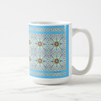 Tasse der farbenfrohen Blumenmuster
