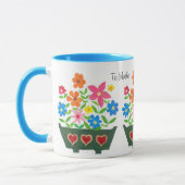 Tasse des Blumenkaffees für Mutter (Links)