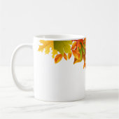 Tasse des Kaffees Herbstblätter (Links)