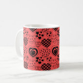Tasse des Kaffees mit wiederholtem Herz (Vorderseite Links)