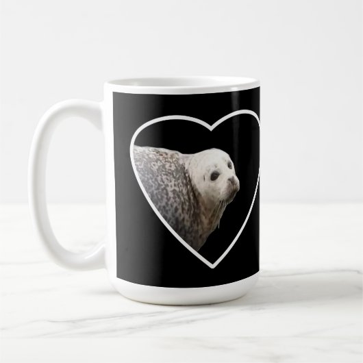 Tasse des niedlichen Siegels (Links)