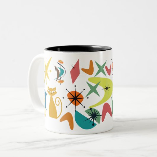 Tasse des Retro-Musters Mitte des Jahrhunderts (Vorderseite Links)