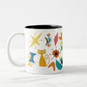 Tasse des Retro-Musters Mitte des Jahrhunderts (Links)