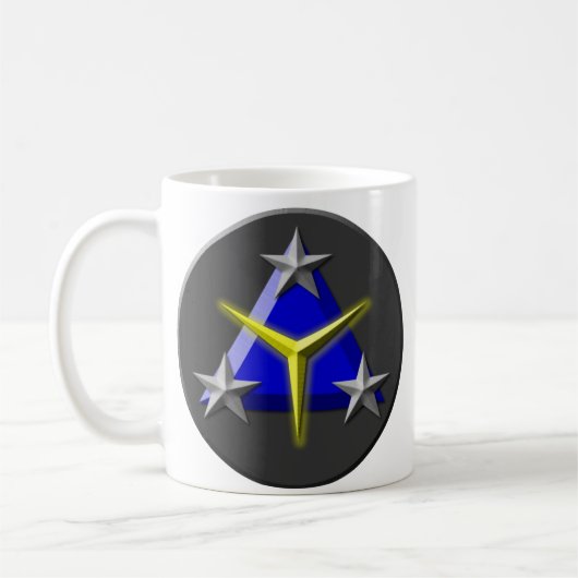 Tasse des Spielzeug-Insignia/TYCS (Links)