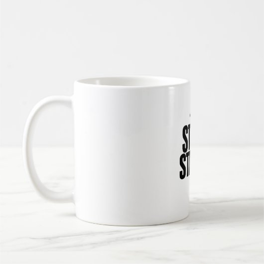 Tasse des starken Faust-Symbols bleibe (Links)