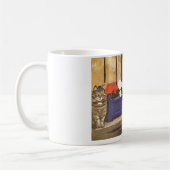 Tasse, die Katzen- und Blumenkasten kennzeichnet Kaffeetasse (Links)