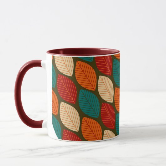 Tasse mit 'Blatt'-Muster im Stil der Mitte des 20. (Links)