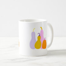 Tasse mit bunten Kürbissen