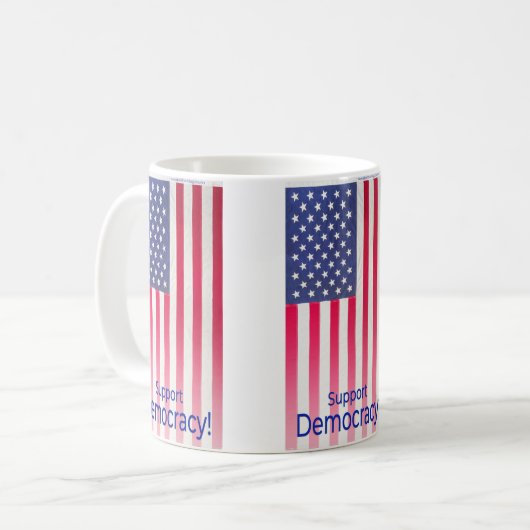 Tasse mit der Flag-Meldung "Support Democracy" (Vorderseite Links)