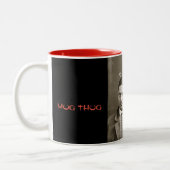 Tasse mit einem Verbrecher (Links)