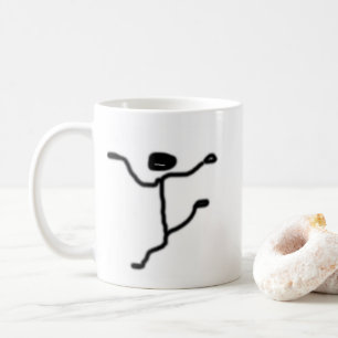 Tasse mit einer kleinen Figur