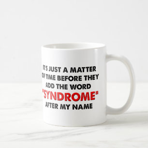 Tasse mit lustiger Aufschrift: "Ein Syndrom nach m