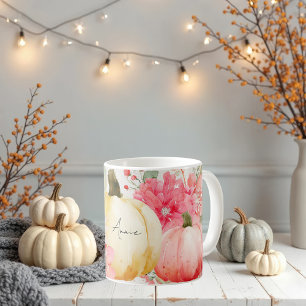 Tasse mit Pumpkins und Blume
