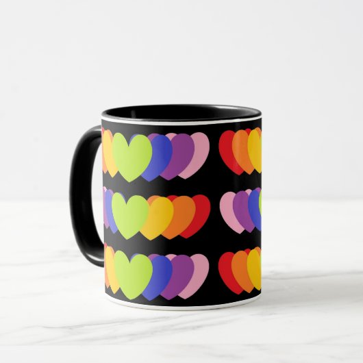 Tasse mit Rainbow-Hörern auf schwarzem Hintergrund (Vorderseite Links)