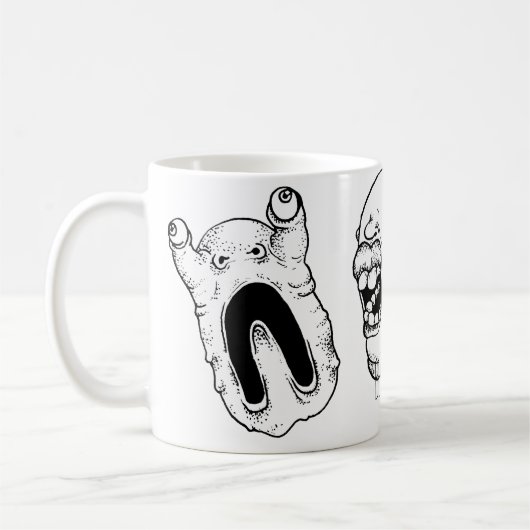 Tasse mit sonderbaren verzerrten Gesichtern (Links)