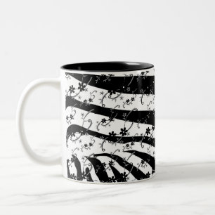 Tasse mit Tier- und zarten Blumendesign