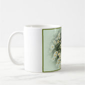 Tasse mit weichen gerahmten Gänseblümchen (Links)